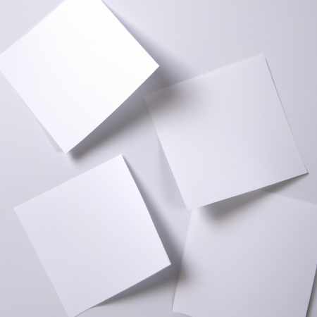 Four blank square papers